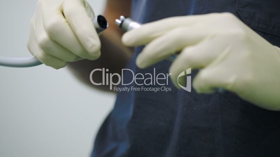 Dentist and modern medical equipment