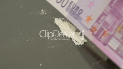 500 Euro paper bill cut the white powder into lines