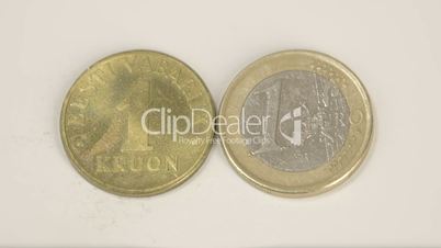 1 Estonian old gold coin and a new 1 Estonia Euro coin