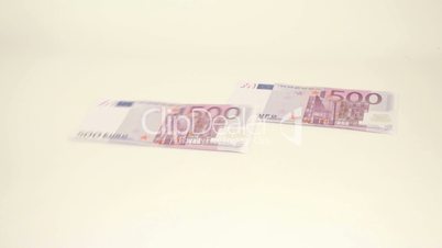 Four 500 Euro bills thrown on the table