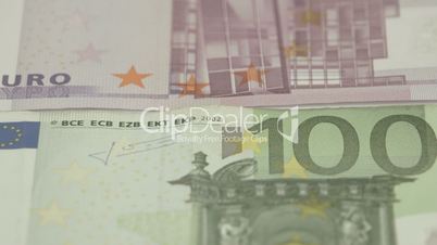 Zoom out view of the two Euro bills