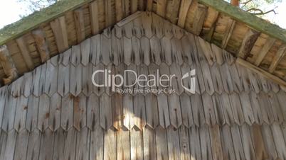 Wooden shingles of the wooden cabin house