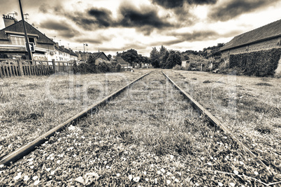 Railroad across an old village