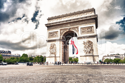 PARIS - MAY 21, 2014: Tourists at Arc de Triomphe. More than 30