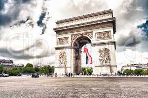 PARIS - MAY 21, 2014: Tourists at Arc de Triomphe. More than 30