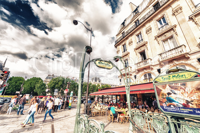 PARIS - MAY 21, 2014: Tourists walk in Quartier Latin. More than