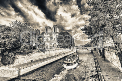 PARIS - MAY 21, 2014: Tourists at Notre Dame Cathedral. More tha