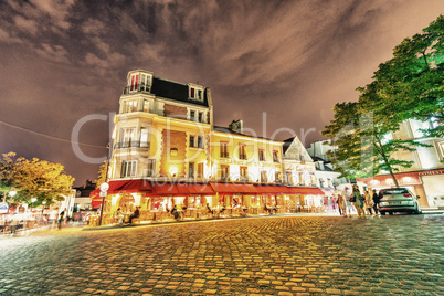 PARIS - MAY 21, 2014: Tourists in Montmartre. More than 30 milli