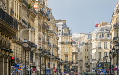 PARIS, JULY 20, 2014: Tourists along city streets. More than 30