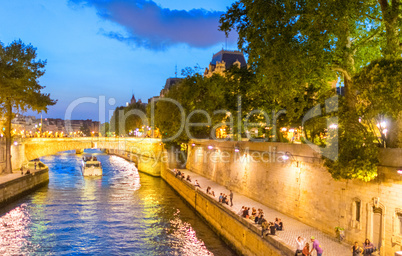 PARIS - JULY 21, 2014: Tourists enjoy city view from a classic b