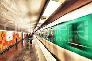 PARIS - MAY 23, 2014: Paris Metro station with fast moving train