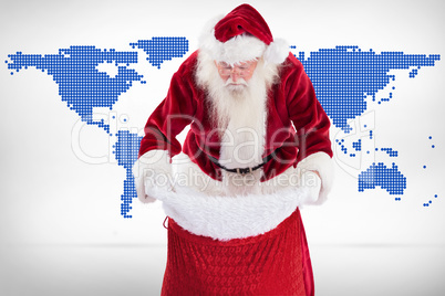 Composite image of santa looks in his bag