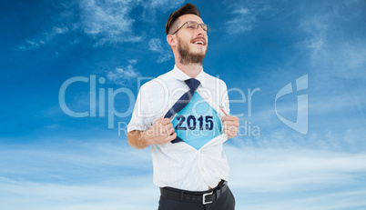 Composite image of geeky hipster opening shirt superhero style