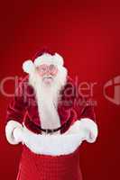 Composite image of santa open his red bag