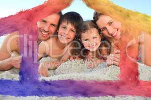 Composite image of family at the beach