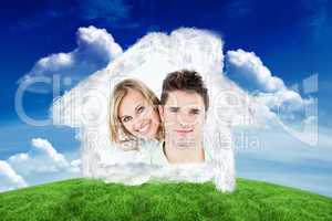Composite image of portrait of a young happy couple standing aga