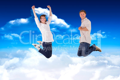 Composite image of couple jumping in the air