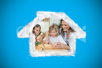 Composite image of woman making sandwiches with her children