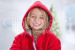 Composite image of cute girl in hooded jumper