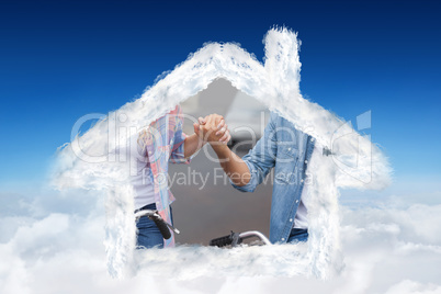 Composite image of hip young couple going for a bike ride