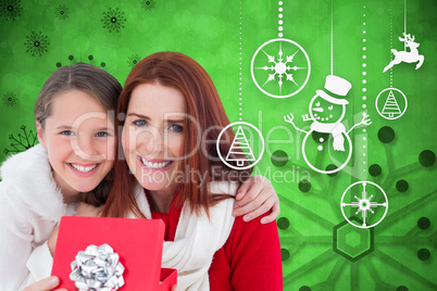 Composite image of mother and daughter with gift Composite image of mother and daughter with gift