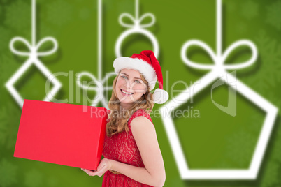 Composite image of pretty blonde in red dress holding a box