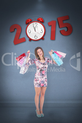 Composite image of woman standing with shopping bag