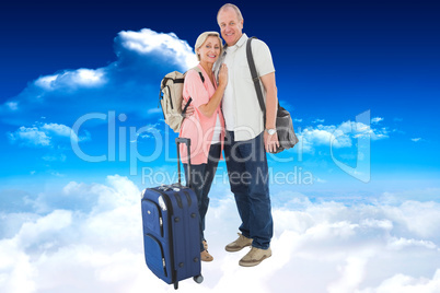 Composite image of smiling older couple going on their holidays