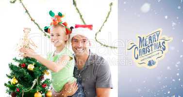 Composite image of happy father and daughter decorating together