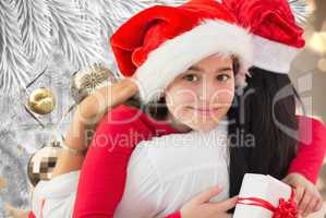 Composite image of little girl getting gift