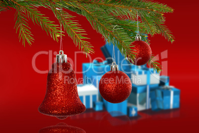 Composite image of red decorations on branch