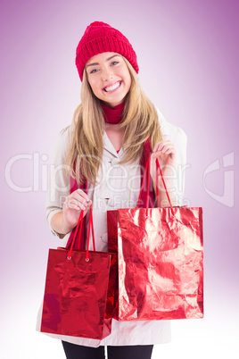 Pretty blonde holding shopping bags