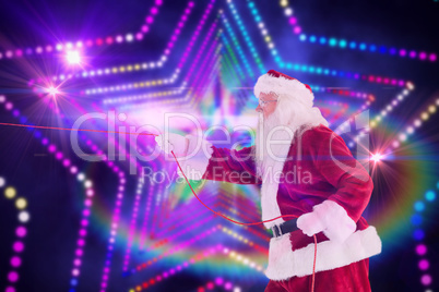 Composite image of santa pulls something with a rope