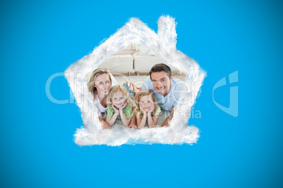 Composite image of happy family on the floor