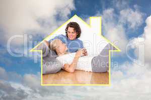 Composite image of young couple cuddling each other
