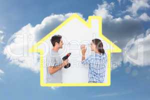 Composite image of cheerful man and his wife doing home improvem