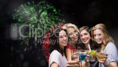 Composite image of friends with drinks