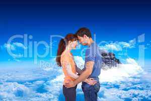 Composite image of couple looking at each other