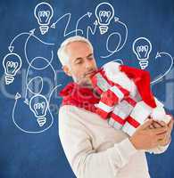 Composite image of happy festive man with gifts