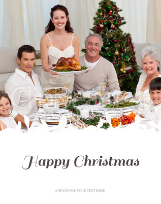 Composite image of family celebrating christmas dinner with turk