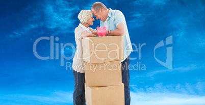 Composite image of older couple smiling at each other with movin