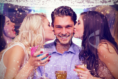 Composite image of friends toasting