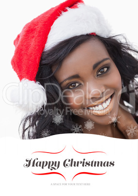 Composite image of woman wearing red dress and santa claus hat