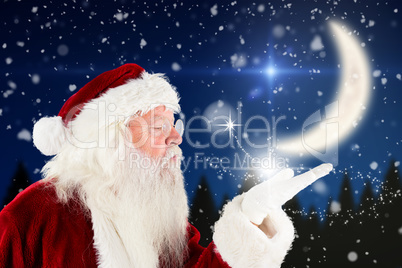 Composite image of santa claus blowing