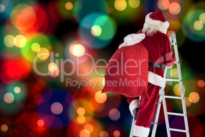 Composite image of santa steps up a ladder