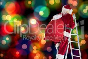 Composite image of santa steps up a ladder