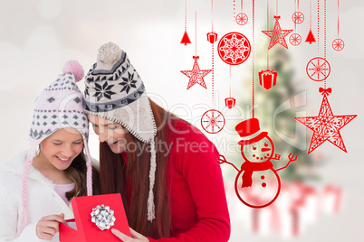 Composite image of mother and daughter with gift