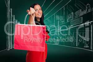 Composite image of woman standing with shopping bag