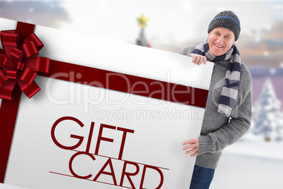 Composite image of winter couple showing poster