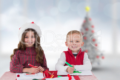 Composite image of cute siblings drawing pictures